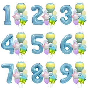 Kit ballons fête montgolfière macaron avec chiffre bleu et ballons étoiles pastel