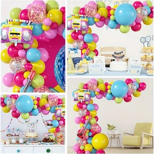 Detail of 80s disco party balloon arch with inflatable radio and red guitar shapes