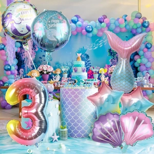 Detailed view of mermaid party balloon set with shell, star and tail foil balloons