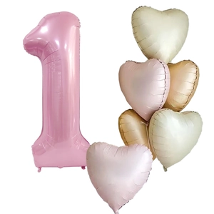 Pink number 1 and heart-shaped pearlescent foil balloons for party decoration