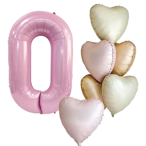 Detail of 40-inch pearlescent pink number 0 balloon with five pastel heart balloons