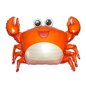 Close-up of a cartoon crab foil balloon in bright orange with white spots for party decor