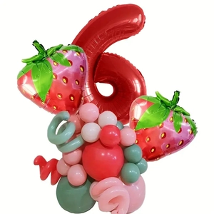 Detail of strawberry party balloon set with red number 6 foil and colorful latex base