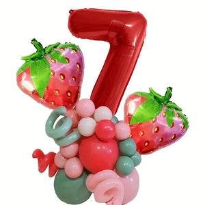 Detail of strawberry birthday balloon set featuring red number 7 and latex balloon base