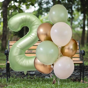 Detail of 40-inch olive green number 2 foil balloon and latex balloons set on park bench