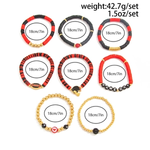 Detail view of Game Day bracelet set with football charms and colorful clay beads