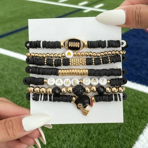 Detail of 7pcs Game Day football beaded bracelet set with helmet charms and heishi beads