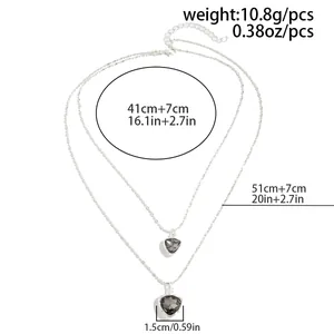 Size guide for layered silver necklaces with grey heart pendants and chain length details
