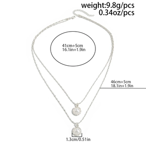 Double-layer silver necklace detail with product dimensions and twin pearl charms