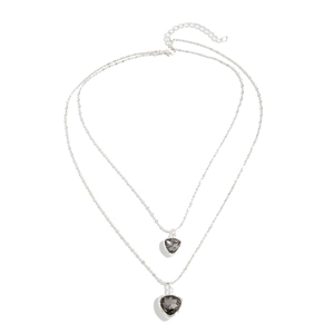 Double-layered silver necklace featuring two grey heart-shaped gemstone pendants for women