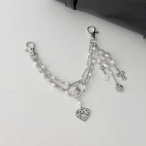 Multi-layer silver heart and pearl bag charm with bow tassels and lobster clasps