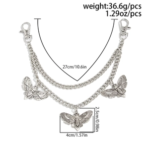Detail view of gothic silver moth skull charms on multilayer metal waist chain with dimensions