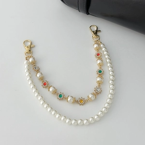 Double-layer pearl bag chain with colorful rhinestone flowers and gold lobster clasps