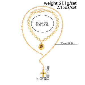 Detailed size chart of layered cross necklace with cat eye stone and chain lengths