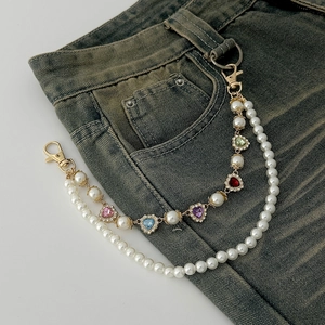 Double-layered pearl bag chain with colorful heart crystals and golden lobster clasps