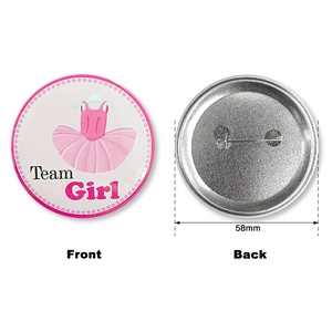 Détail recto-verso d'un badge Team Girl de 58 mm pour baby shower avec épingle