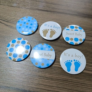 Set of 6 blue Baby Boy gender reveal tinplate badges with polka dots and footprints