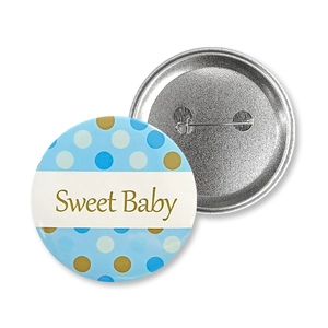 Detailed front and back view of Sweet Baby tinplate badges with blue polka dots