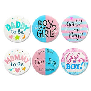 Set of 6 gender reveal party button pins with blue and pink baby shower designs