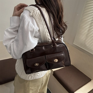 Chocolate brown glossy leather square handbag with twin front twist-lock pockets