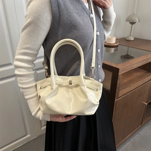 Minimalist creamy white glossy pleated bucket bag with stylish double ring handles for women