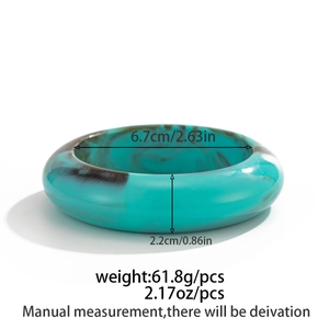 Detail showing dimensions of green marble resin bangle with dimensions and weight info
