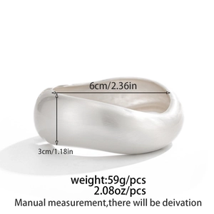 Detailed view of silver minimalist bangle with dimensions 6cm diameter and 3cm height