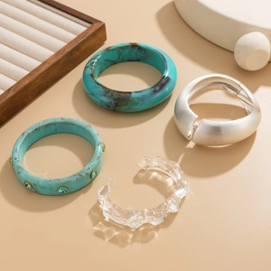 Detailed collection of marble resin, crystal, and matte silver luxury bangles for women