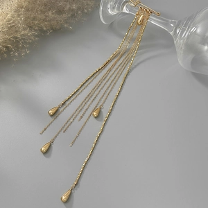 Broche à pampilles dorées avec longues chaînes et pendentifs gouttes pour costumes