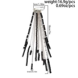 Detail view of 18cm long black beaded fringe brooch with silver safety pin base