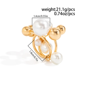 Detailed view of beaded open ring showing weight and size with pearls and gold spheres