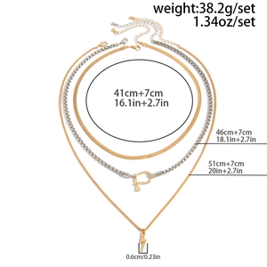 Detailed size specifications for layered gold snake chain and lightning bolt necklaces