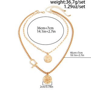 Detailed size chart for gold layered necklace featuring coin and compass pendants