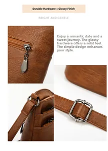 Detail of dark brown leather texture with thick gunmetal zipper and adjustable strap buckles