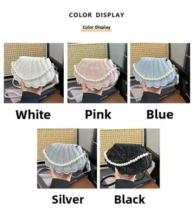 Shell-shaped handbags with pearl handles in white pink blue silver and black colors