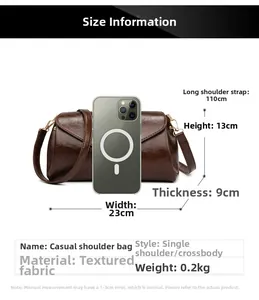 Detailed size chart of vintage brown shoulder bag with dimensions and phone for scale
