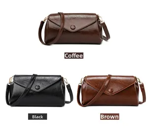 Minimalist vintage envelope crossbody bags displayed in coffee, black, and brown colors