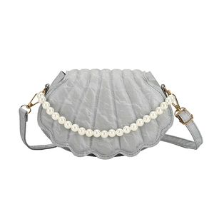 Minimalist shell shaped light gray handbag with marble texture and pearl chain