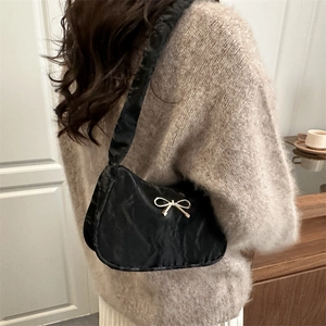 Chic black cloud bag with golden butterfly buckle and pleated strap for women