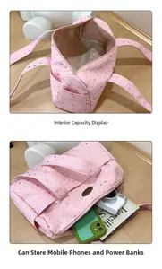 Detailed view showing the large internal capacity of the pink star Boston barrel bag