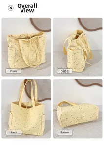 Viste multiple della borsa tote in tela gialla con stelle argentate e tasche laterali
