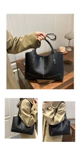 Détails du cabas en cuir noir mat avec surpiqûres blanches contrastées et fines bandoulières