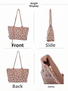 Detail view of pink corduroy tote bag showing strawberry prints and zipper closure