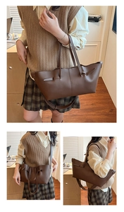 Detail of dark brown tote bag with decorative knot and adjustable shoulder strap