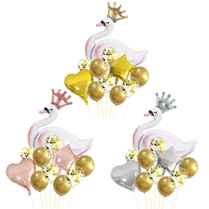 Detail of swan foil balloon set with heart, star, and gold confetti latex balloons