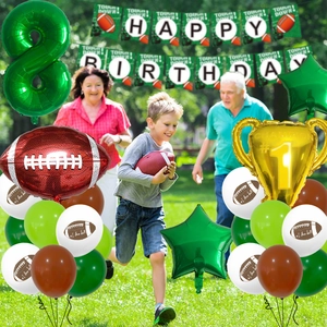 Football birthday party decoration set with green number 8 balloon and trophy on grass