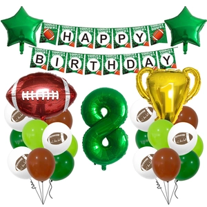Detail of football birthday set with trophy balloons, green number 8, and party banners