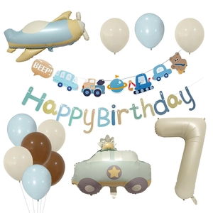 Detailed set of airplane and car balloons with cream number 7 and happy birthday banner