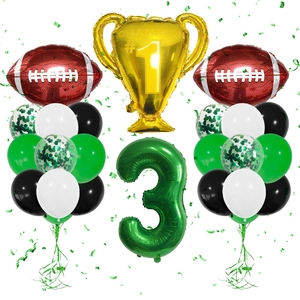 Football party kit featuring trophy, brown rugby foil balloons, and green number 3 display