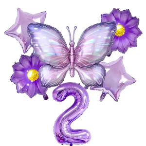 Detail of purple butterfly balloon set including number two and floral shaped foil decorations